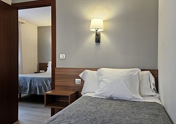 Habitació triple amb 2 dormitoris